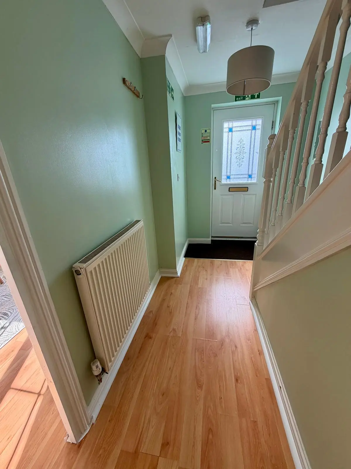 Entrance hallway with front door and staircase