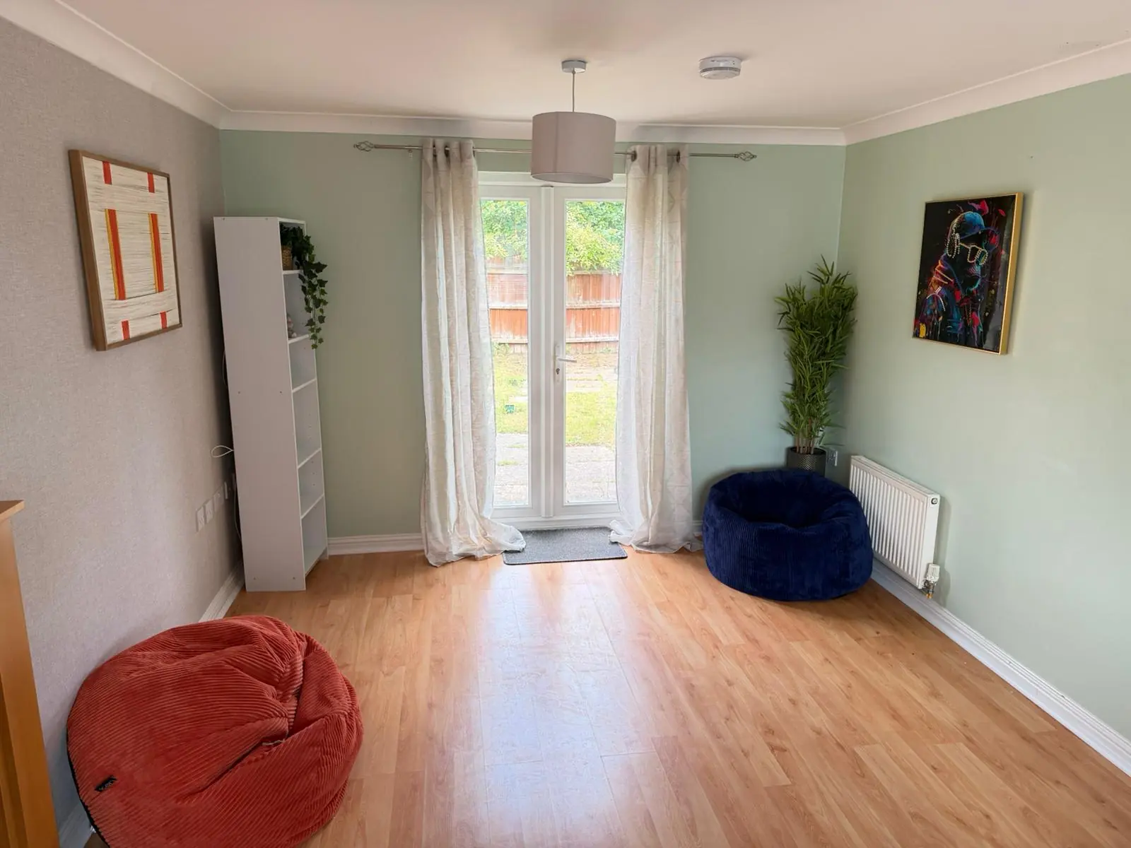 Reception room with garden doors and soft seating